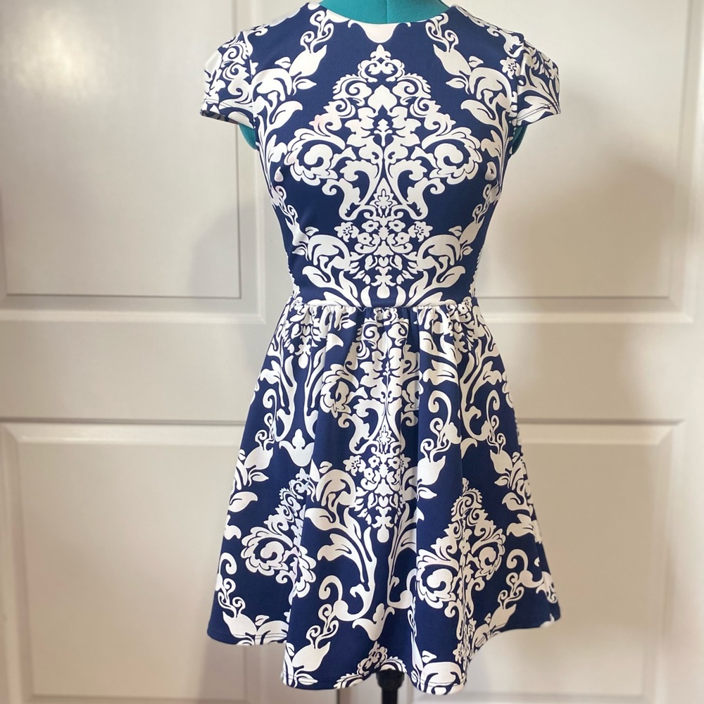 B. Darlin blue and white pattern Aline mini dress with sheer back Size S
